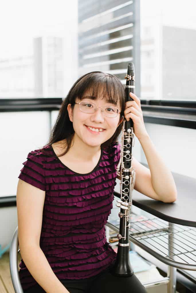 Picture of Anna seated with a clarinet