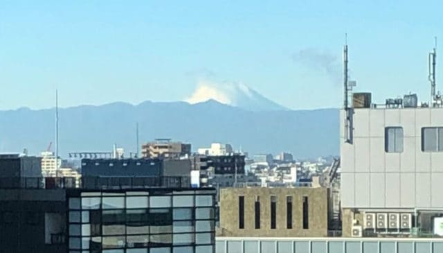 A photograph from Anna's window in Tokyo showing Mt Fuji